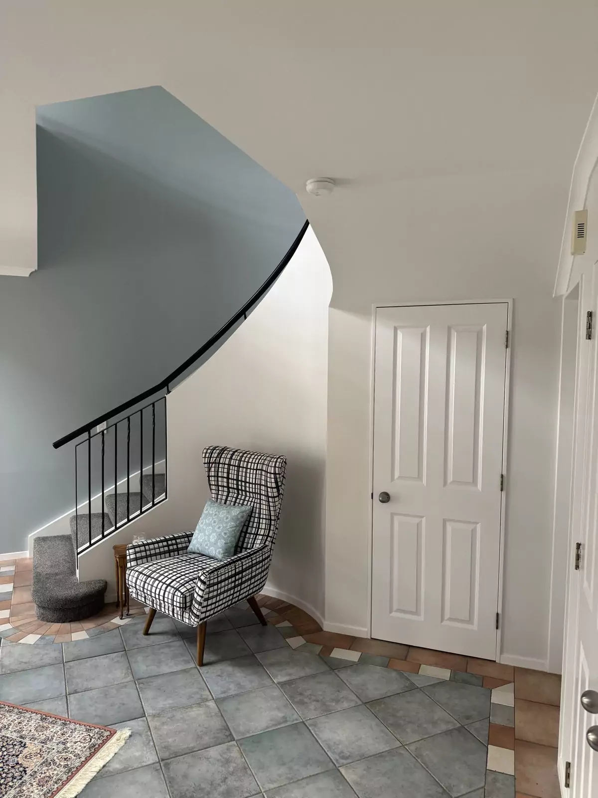 Refreshed curved stairwell interior